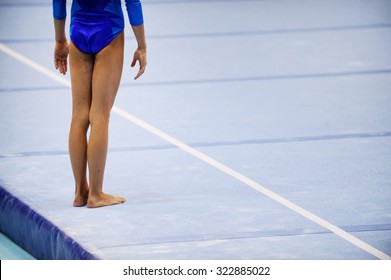 Feet Of Gymnast Are Seen On The Floor Exercise Before Gymnastics Competition