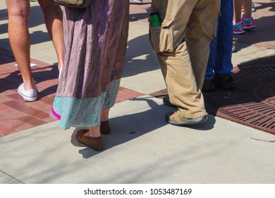 Feet And Legs Of Protesters In Shorts, Long Pants And A Hippy Skirt At March For Life Protest