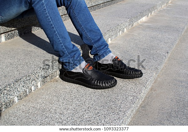 moccasins on feet