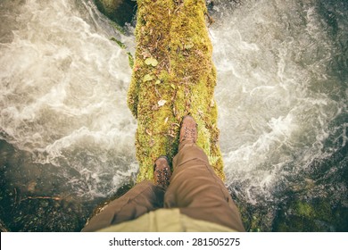 Feet Man Trekking Boots Hiking Outdoor With River And Stones On Background Lifestyle Travel Survival Concept Top View