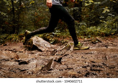 Feet Men Runner Running Spring Trail Of Mud And Water