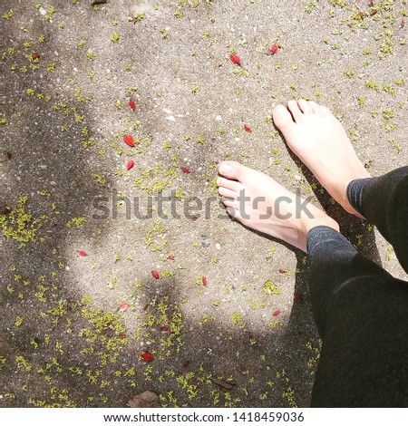 Feet on the floor in the sun