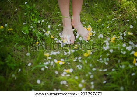 feet on the grass