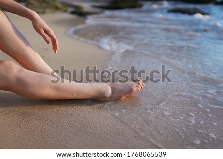 Feet on the sand beach travel vacation enjoyment island tropics