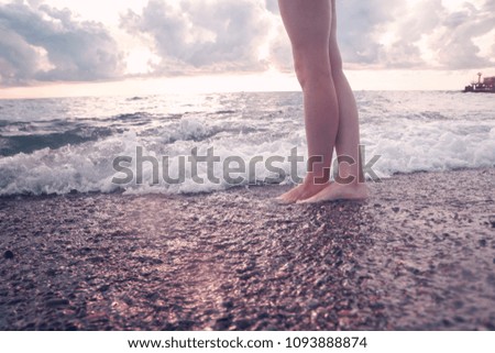 Feet on the sea