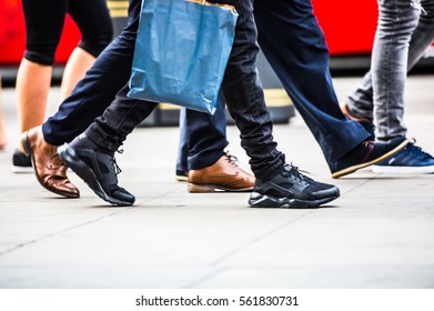 Feet Of Pedestrians Walking On The Crosswalk In Oxford Street, London. Modern Life, Travel And Shopping Concept