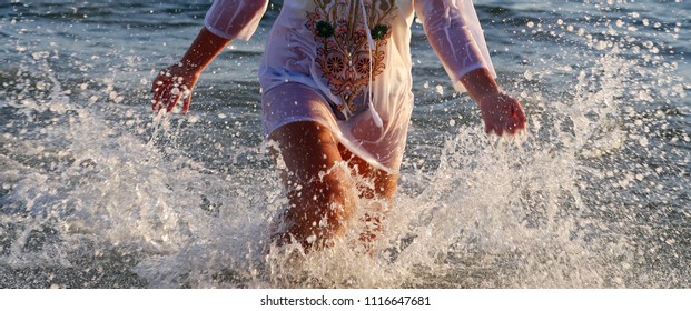 Feet Running On Water And Splashing Water