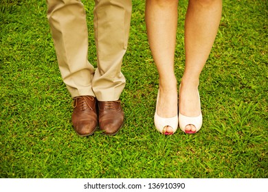 feet and shoes of newlyweds