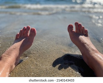 Feet Sinking In The Sand, Close Up