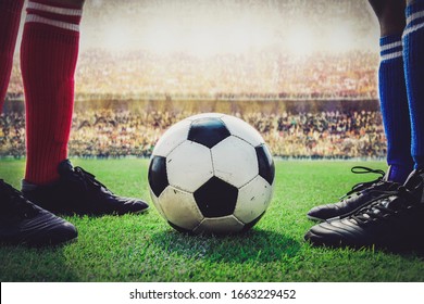 Feet Of Soccer Players Kick Off In The Stadium Match