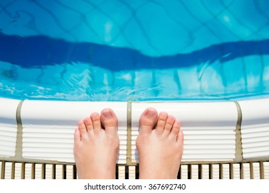 Feet At The Swimming Pool