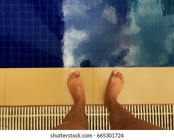 Feet In Swimming Pool.