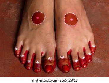 Feet Of A Teen Girl Painted With Red Color As Per Rituals Of Indian Hindu Festival Called Kumari Puja Which Is Held To Celebrate Ceremonious Worship Of Young Girls In Sense Of Divine Mother.