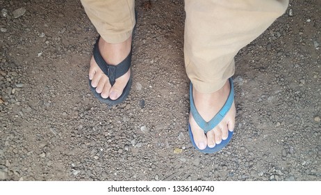 The Feet That Wear The Wrong Pair Of Sandals. Concept Some Days, We Can Make Mistakes Even Easily.