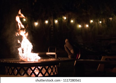 Feet warming by fire