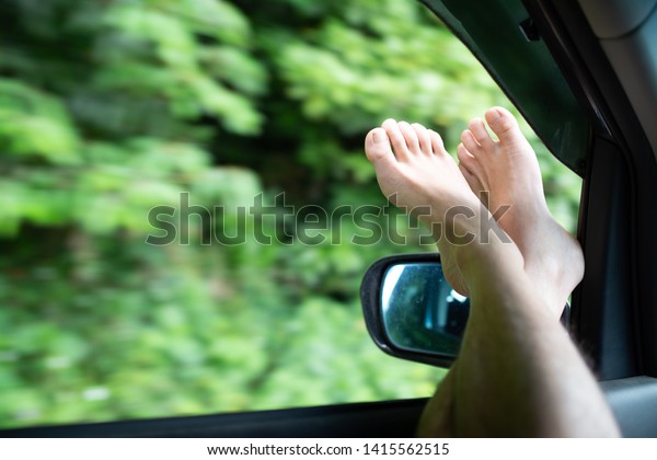 Feet\
from the window of the front passenger seat of a\
car