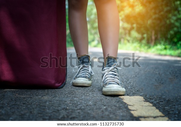 Feet of a woman\
tourist