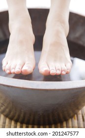 The Feet Of Woman Undergoing Foot Bath
