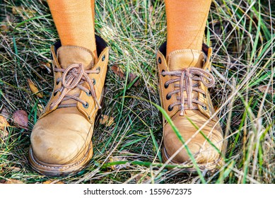 Feet In Yellow Boots . Autumn Walk . Ridiculous Photo