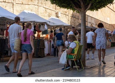 Felanitx, Spain; August 21 2022: Lottery Street Vendor For ONCE, The Spanish National Organization For The Blind, At The Street Market In The Mallorcan Town Of Felanitx, Spain