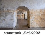 Felixstowe, UK - September 16 2023: Interior of military building of historical value - Landguard Fort. Arched doorway through many rooms.