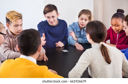 Fellow Students Playing Mafia Game At Recess During A School Day 