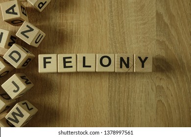 Felony Word From Wooden Blocks On Desk