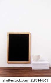 Felt Letter Board Mockup Hanging On The Wall With Stack Of Books And Coffee Cup , Mockup Design