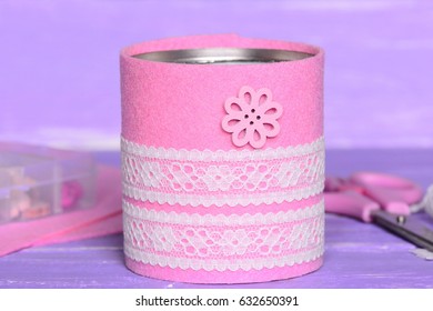 Felt And Ribbon Recycled Tin Can. Recycling Tin Cans Into Holder To Contain Pens, Pencils, Markers And Other Office Supplies. Thrifty, Quick And Easy Recycled Home Crafts Concept. Closeup