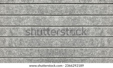 Felt texture background. Seamless pattern of grey felt panel surface with linings. Decorative elements for wall, door panel or any background.