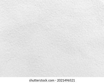 Felt white soft rough textile material background texture close up,poker table,tennis ball,table cloth. Empty white fabric background. 