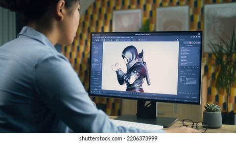 Female 3D designer creating and drawing character for video game using computer while sitting at the table at home office and doing distant work. 3D modeling - Powered by Shutterstock - Get 15% off with code: PIKWIZARD15