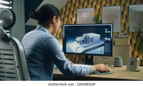 Female 3D designer at home working on 3D modeling project of house and creating exterior in professional computer program using pc - Powered by Shutterstock