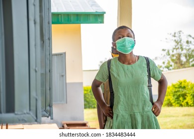 Female African School Kid Wearing A Face Mask