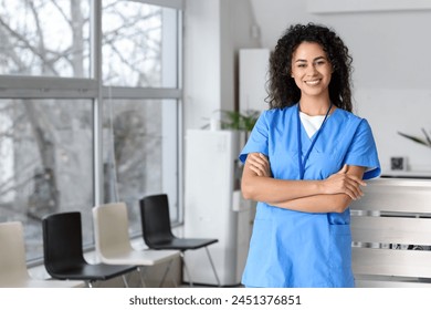 Female African-American medical intern in clinic - Powered by Shutterstock