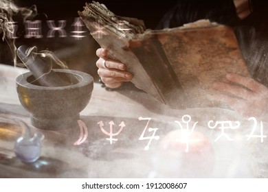 Female alchemist with old book making elixir in laboratory, closeup - Shutterstock ID 1912008607