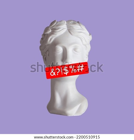 Female antique statue's head with line of swearing speech censored with symbols on her mouth isolated on purple background. Trendy collage in magazine style. Contemporary art. Modern design
