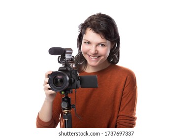 Female Art Student Studying To Be A Filmmaker Using A Camera On A Tripod For A Project. She Looks Confident About Her Creativity. Depicts Entertainment Industry Production And Education