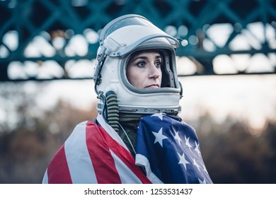 Female Astronaut With American Flag.