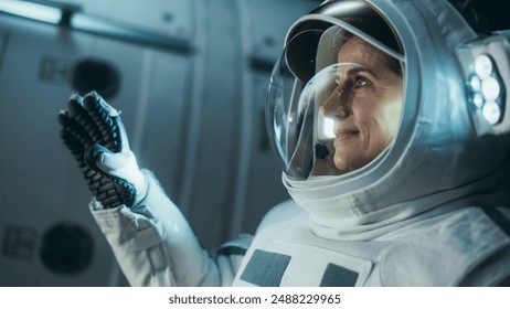 Female Astronaut Landed on the Moon. Close-Up of a Beautiful Female Astronaut Standing in Space, Looking at Blue Planet Earth. Blue Planet Reflecting in Her Helmet. Advanced Space Travel Concept - Powered by Shutterstock