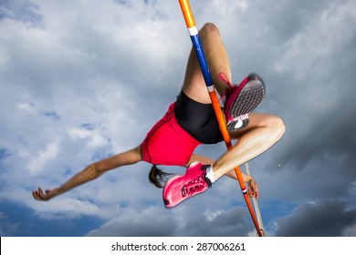 female athlete in high jump in track and field