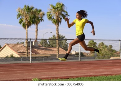 Female Athlete Running On Race