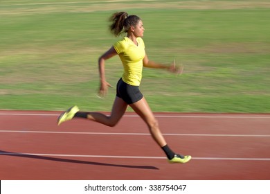 Female Athlete Running On Race