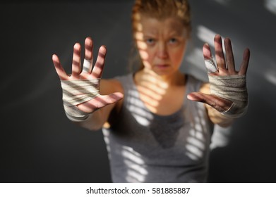 Female Athlete Stretching Forward Sweaty, Dirty Hands. Motivation Of Sports.