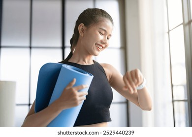 female athlete using smartwatch before exercise - Powered by Shutterstock