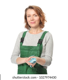 Female Auto Mechanic Wiping Hands With Rag On White Background