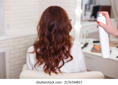 
Female Back With Long, Curly, Red Hair, In Hairdressing Salon
