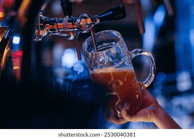 Female Bartender pouring beer at the bar. Close up hands	 - Powered by Shutterstock