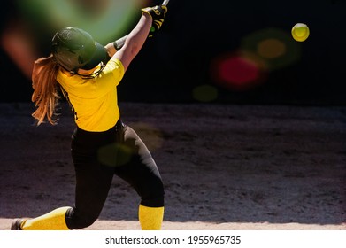 A Female Baseball Player Is Swinging For The Fences - Powered by Shutterstock