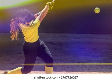 A Female Baseball Player Is Swinging For The Fences - Powered by Shutterstock